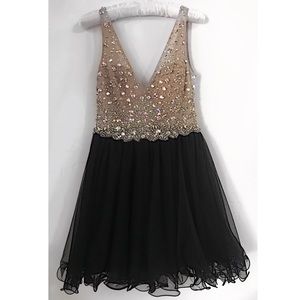 Beaded dress with black tulle bottom